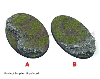 May include: Two oval-shaped miniature bases with textured terrain. The bases feature a combination of green grass, brown earth, and gray rock formations. The bases are labeled A and B. The text "Product Supplied Unpainted" is below the bases.