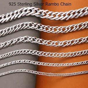 May include: Six 925 sterling silver Rambo chains of varying thicknesses arranged horizontally. Each chain features a polished, interlocking link design with a bright, reflective metallic finish. The text 925 Sterling Silver Rambo Chain is visible at the top.