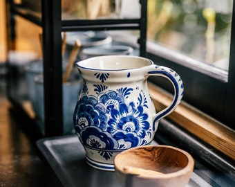 Small Delft blue vase in the shape of a jug | Hand-painted with flowers and birds | Made in Holland | Contains hairlines! |