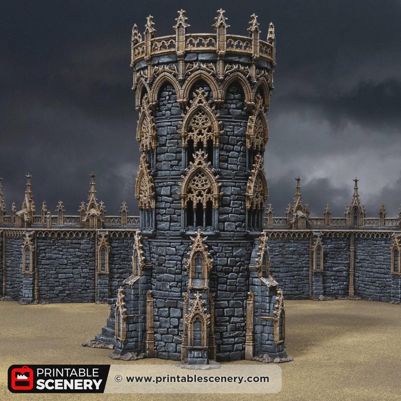 May include: A tall, cylindrical stone tower featuring dark grey masonry and intricate tan-colored gothic architectural details. The structure includes arched windows, decorative spires, and a connected stone wall section with matching trim.