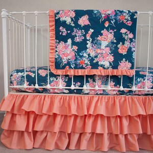 Coral and navy nursery bedding 2025