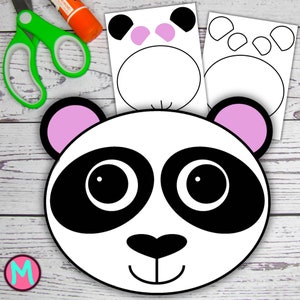 May include: A black and white panda bear face craft template with pink ears, black eyes, and a black nose. The template is ready to be cut out and decorated.
