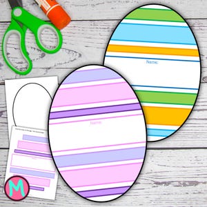 May include: An assortment of craft supplies on a light wood grain surface. Includes green scissors, a glue stick, and printed Easter egg templates with striped designs in pink, purple, blue, and green. Each egg has a space to write "Name:"