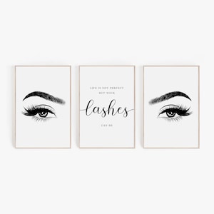 May include: Three black and white prints with a quote about lashes. The quote reads "Life is not perfect but your lashes can be". Each print features a stylized illustration of an eye with long eyelashes.