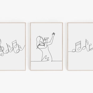 Könnte beinhalten: Set aus drei Schwarzweiß-Linienzeichnungen mit einer singenden Frau, einem Violinschlüssel und Noten. Die Drucke sind in einfachen Holzrahmen gerahmt.