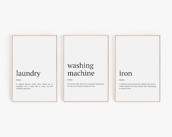 May include: Three minimalist black and white prints with definitions for the words "laundry", "washing machine", and "iron".