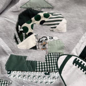 Hoodie Michigan State, sweater met applicatie MSU, hoodie Spartans patchwork, sweater College Football, hoodie Game Day, aangepaste teamgeest