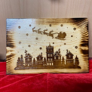 Santa Flying Over Village Sign (Free Shipping)
