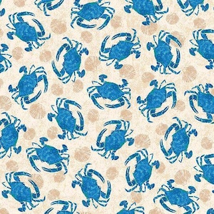 May include: A repeating pattern of blue crabs and tan seashells on a cream-colored background. The crabs are detailed with textured blue markings, and the seashells are scattered throughout the design. This nautical-themed pattern is suitable for fabric or wallpaper.