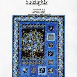May include: A blue and black quilt pattern titled "Sidelights" with a tree design. The quilt features a floral border and square accents. The text "Pattern #301 A Pieced Quilt Design by Kari Nichols" is visible.
