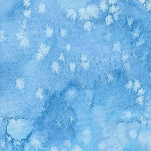 May include: A close-up of a fabric with a watercolor effect. The fabric features a blend of light and dark blue hues, with white, snowflake-like patterns scattered across the surface. The overall effect is soft and dreamy.