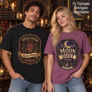 May include: A black t-shirt featuring a graphic of a heart with vines and the text Special Edition Love Potion, and a purple t-shirt with a moon graphic and the text Moon Dust Elixir. The image includes the text 15 Unique Designs Available.