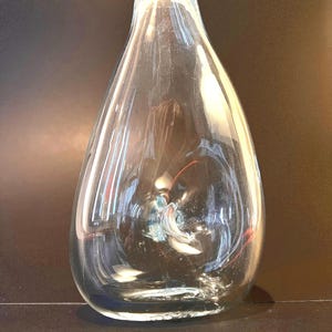 Glass Art Bottle with hole in the middle , signed