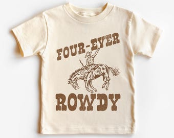 May include: A beige t-shirt with a brown graphic of a cowboy riding a horse. The text "FOUR-EVER ROWDY" is printed on the shirt.