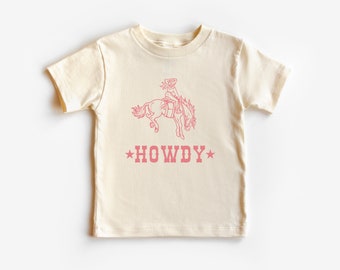 Howdy, Pink Cowgirl Short Sleeve T-Shirt | First Rodeo Outfit for Girl | Western, Wild West Tee | Rodeo Queen | Gift | Baby, Toddler, Kid