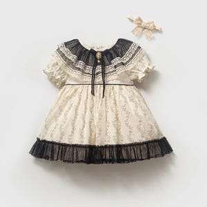 cream and black toddler dress Cream and Black Toddler Dress