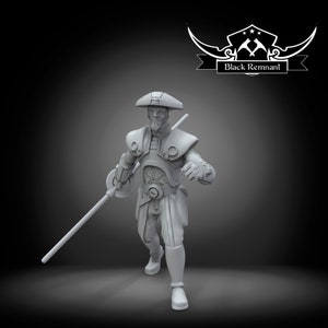 May include: A gray 3D printed miniature of a fantasy character wearing a hat and holding a staff. The character is wearing armor and has a detailed face. The miniature is standing on a gray background. Black Remnant is printed on a banner above the character.