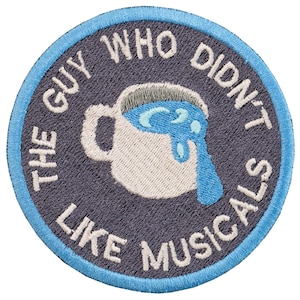 Écusson brodé musical « Le type qui n'aimait pas les comédies musicales ». 8 cm. Motif personnalisé. À coudre ou à repasser.
