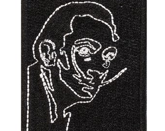 Dalí embroidered patch. Sew-on or iron-on. 7cm x 5.5cm.