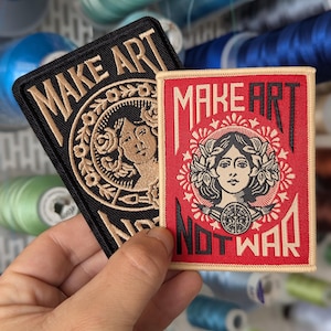 Make art not war embroidered patch. Sew-on or iron-on. 8cm x 6.5cm. Two designs to choose from.