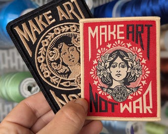 Make art not war embroidered patch. Sew-on or iron-on. 8cm x 6.5cm. Two designs to choose from.