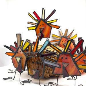 Handmade silly turkey suncatchers, perfect for any occasion!