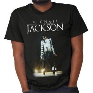 May include: Black t-shirt featuring a stage image of Michael Jackson. The text "MICHAEL JACKSON" is printed in white above the image. Jackson is wearing a white jacket, black pants, and black shoes.