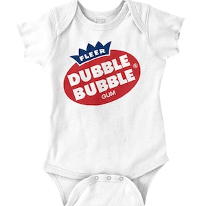 May include: White baby onesie with the "Dubble Bubble Gum" logo in red and white. The logo is an oval shape with the words "Dubble Bubble" in large white letters and "Gum" in smaller white letters. Above the oval is a blue crown and the word "Fleer".