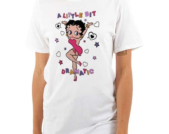 May include: White t-shirt with a cartoon image of Betty Boop in a pink dress and the text "A little bit dramatic" in colorful letters.
