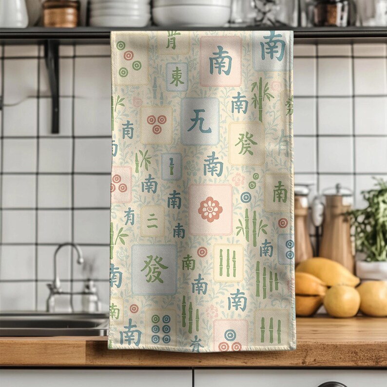 Vintage style Mahjong tile tea towel shown against a tiled kitchen backsplash