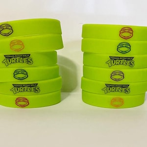 Inspired Teenage M. N. Turtles bracelets, glow in the dark 12 count