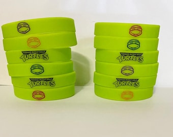 Inspired Teenage M. N. Turtles bracelets, glow in the dark 12 count