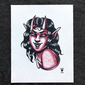 May include: A pink and black illustration of a female demon with horns, long black hair, and a flower tattoo on her shoulder. The image is signed "LVH '22".
