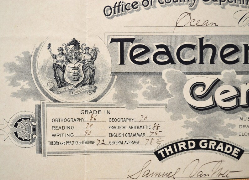 May include: A black and white teacher's certificate with the text "Teacher Certificate" and "Third Grade". The certificate includes a seal with a coat of arms and a list of subjects with grades: Orthography 86, Reading 70, Writing 90, Geography 70, Practical Arithmetic 85, English Grammar 75, Theory and Practice of Teaching 72, General Average 78 1/2.