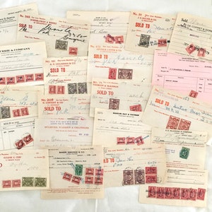 May include: A collection of vintage paper receipts with red and green stamps. The receipts are for various businesses and include the text "Sold To" and the names of the businesses.