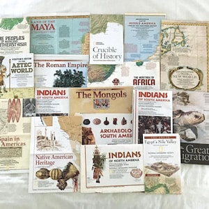 May include: A collection of vintage National Geographic magazines and travel guides. Titles include "The Peoples of Southeast Asia," "Land of the Maya," "The Roman Empire," and "Indians of South America." The covers feature maps, illustrations, and historical imagery.