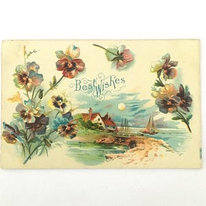 May include: A vintage rectangular postcard featuring a colorful illustration of pansy flowers on the left and right sides. In the center, a coastal scene depicts a house, a sailboat, and a full moon. The text Best Wishes is written in blue.