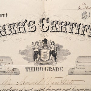 May include: A black and white image of a teacher's certificate from the State of New Hampshire. The certificate is for the Third Grade and is dated 1877. The certificate includes the name of the teacher, Samuel Vanhote, and the grades received in various subjects.