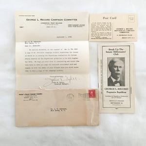 May include: A collection of vintage political campaign ephemera, including letters, a postcard, and a pamphlet. The items feature text related to George L. Record, a Progressive Republican candidate. The materials are aged with visible wear.
