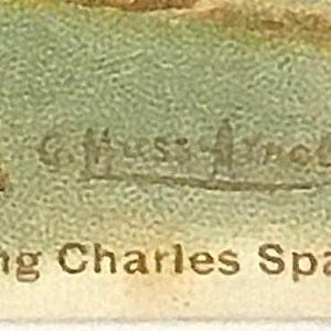 Closeup of dog identification and artist's signature.