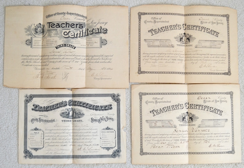 May include: Four vintage teacher's certificates from Ocean County, New Jersey. Each certificate is printed on paper with a decorative border and features the text "Teacher's Certificate" and "Third Grade".