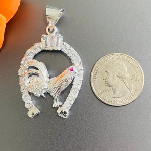 Horseshoe Sterling silver pendant. Dije de herradura de plata 925
