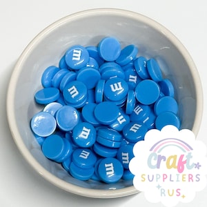Nep cabochons van M&M's, cabochons van nepchocolade, cabochons van nep chocoladehars, nepbak