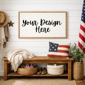 May include: A rustic wooden bench with a framed sign that reads "Your Design Here." An American flag pillow, a woven basket, and a blanket are on the bench. A straw hat and American flag are on the wall.