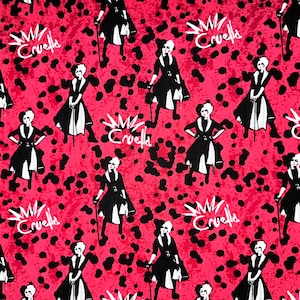 May include: A pink and black fabric with a repeating pattern of a woman in a black coat and white gloves holding a cane. The text "Cruella" is repeated throughout the fabric.