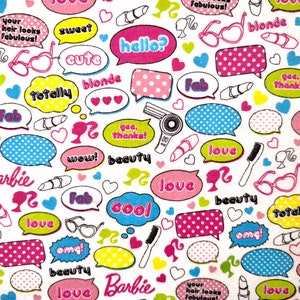 May include: A white fabric with a repeating pattern of speech bubbles, hearts, and beauty-related icons. The bubbles contain words like "hello," "cute," and "wow!" in various colors. The word "Barbie" is also present.