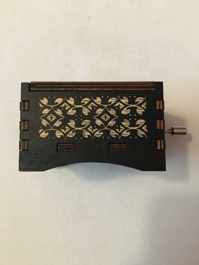 Hand crank music box with wood engraving