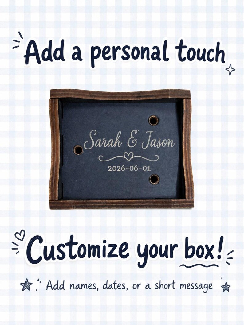 May include: A rectangular wooden box with a dark finish and a black interior base. The base is engraved with the names Sarah & Jason, a heart icon, and the date 2026-06-01. Three small circular holes are visible on the black interior surface.