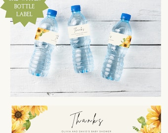 May include: Eight water bottle labels with a sunflower design. The labels say "Thanks" Olivia and David's Baby Shower June 30th 2023.