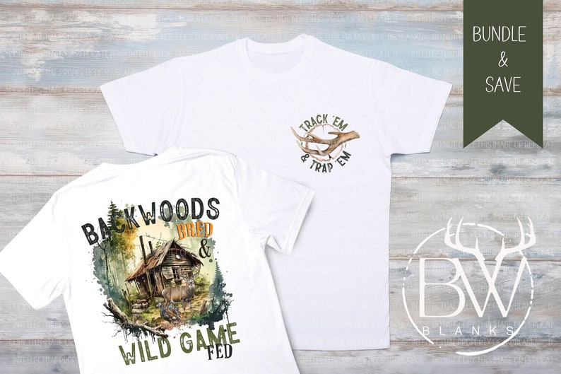 May include: Two white t-shirts with hunting-themed designs. The front of one shirt features a deer antler design with the text "Track 'em & Trap 'em". The back of the other shirt features a cabin in the woods with the text "Backwoods Bred & Wild Game Fed".